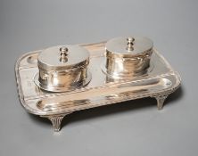 A late Victorian silver rounded rectangular inkstand, with two wells and two pen recesses, Charles