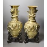 A pair of large Chinese bronze vases on stands,45.5 cms high including stands