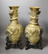 A pair of large Chinese bronze vases on stands,45.5 cms high including stands