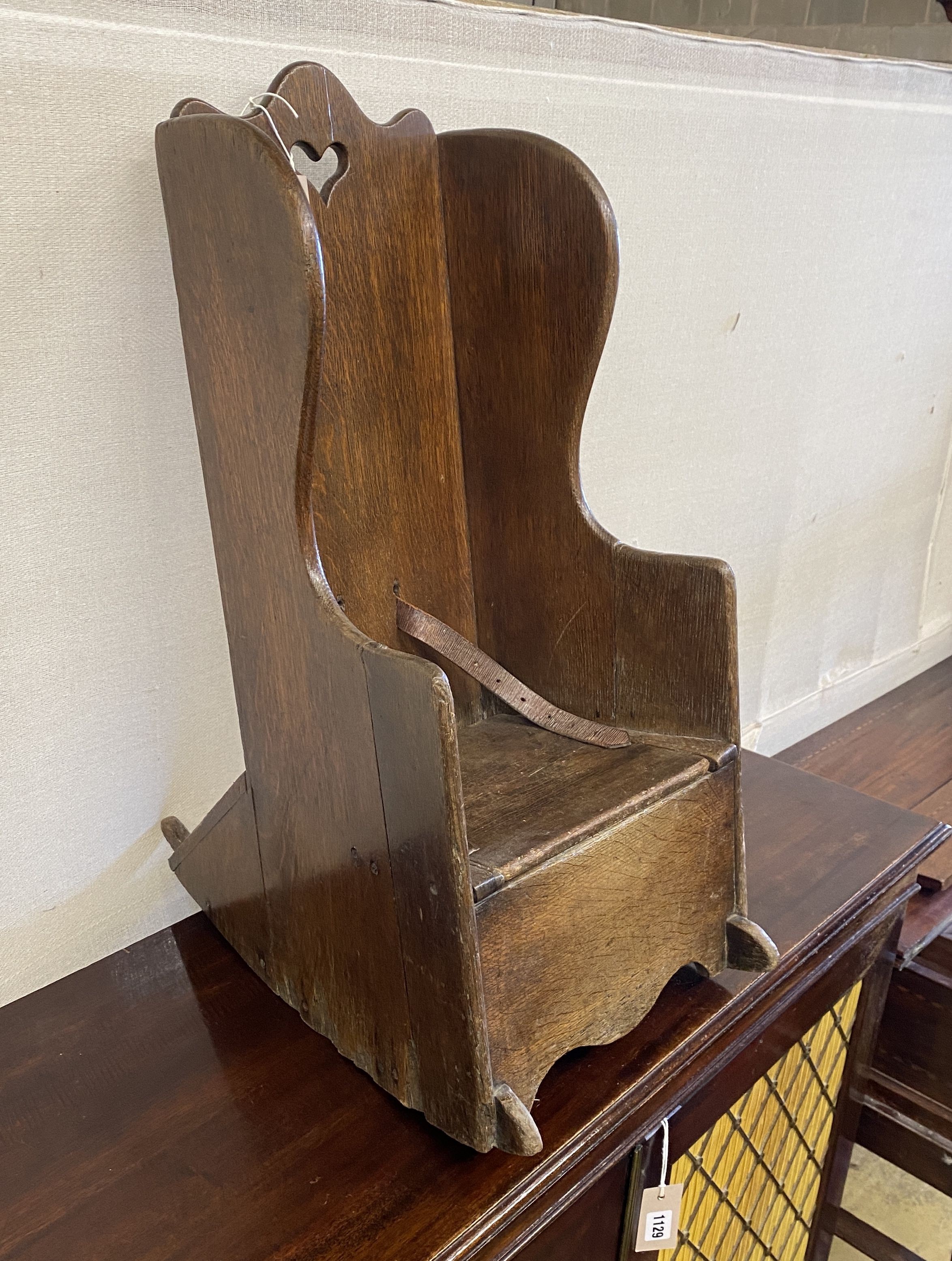 An 18th century oak child's rocking commode chair, width 33cm, depth 50cm, height 70cm - Image 2 of 3