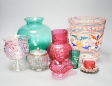 A collection of cranberry glass, a silver lidded glass sugar bowl, and enamelled glass historismus