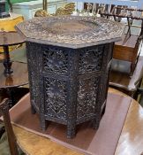 An Indian carved hardwood octagonal occasional table, width 53cm, height 55cm