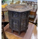 An Indian carved hardwood octagonal occasional table, width 53cm, height 55cm