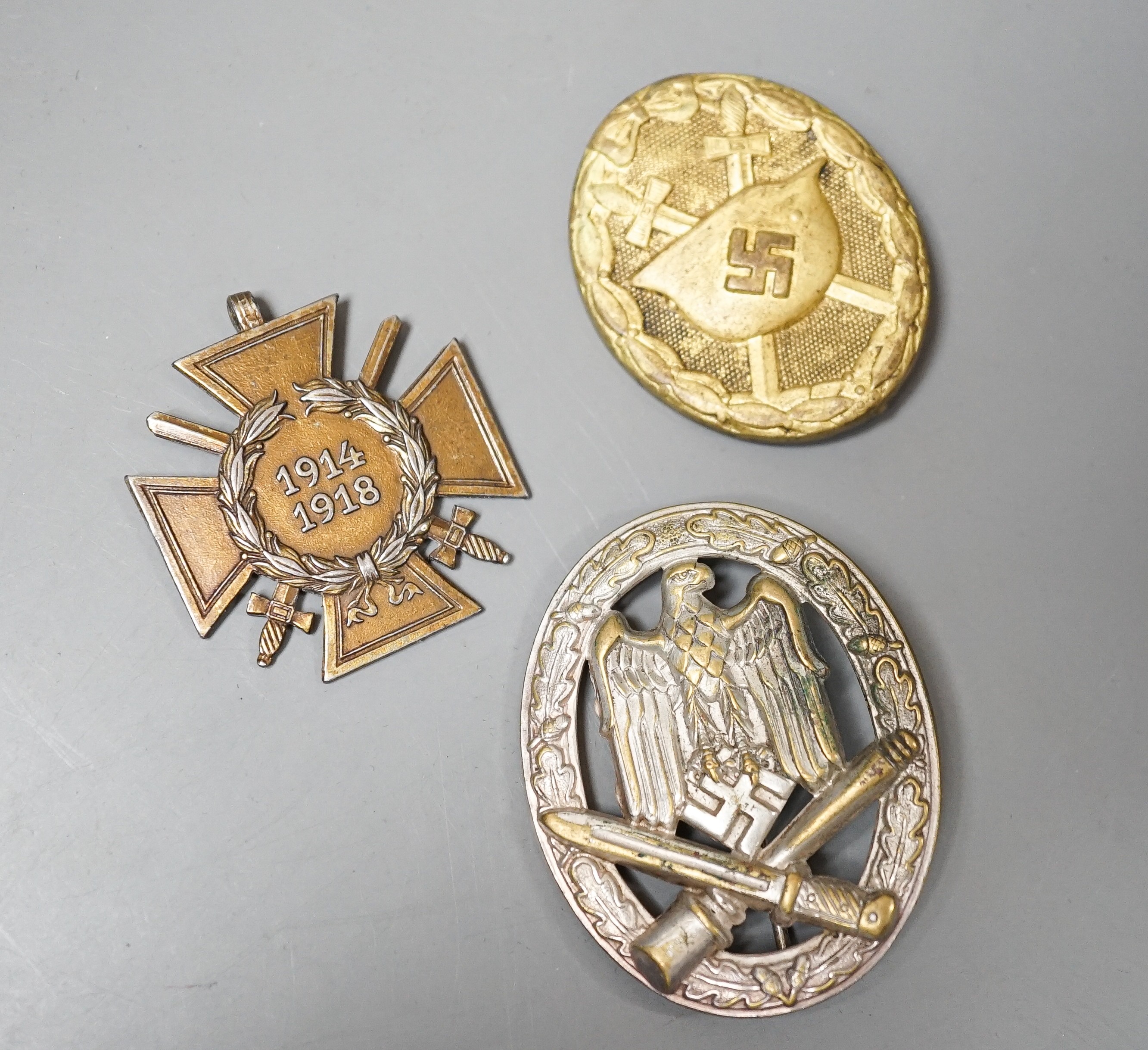 A WW2 German Army / Waffen-SS General Assault Combat Badge in Silvered brass and a Third Reich Wound