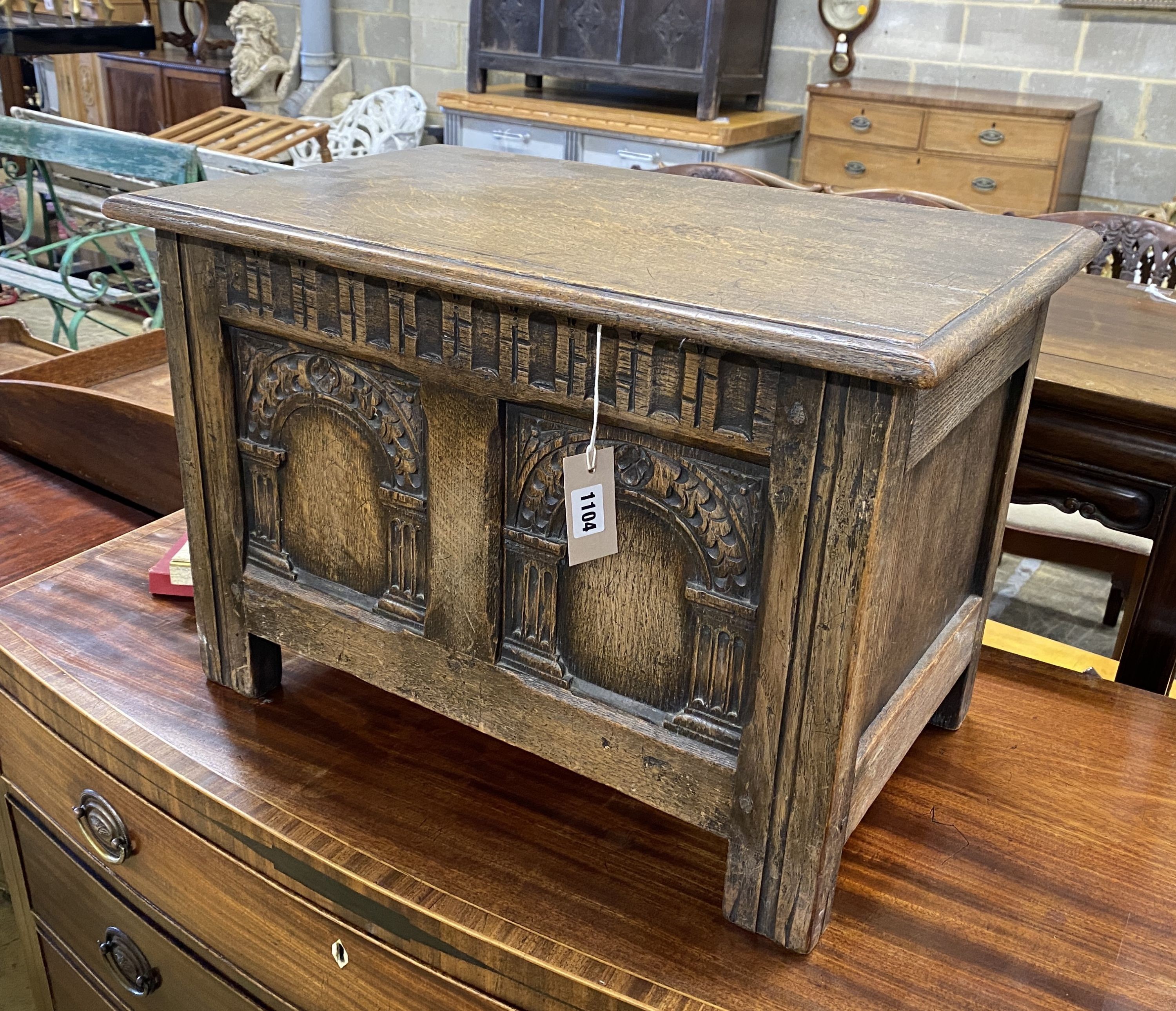 A small 17th century style oak coffer, length 61cm, depth 36cm, height 41cm