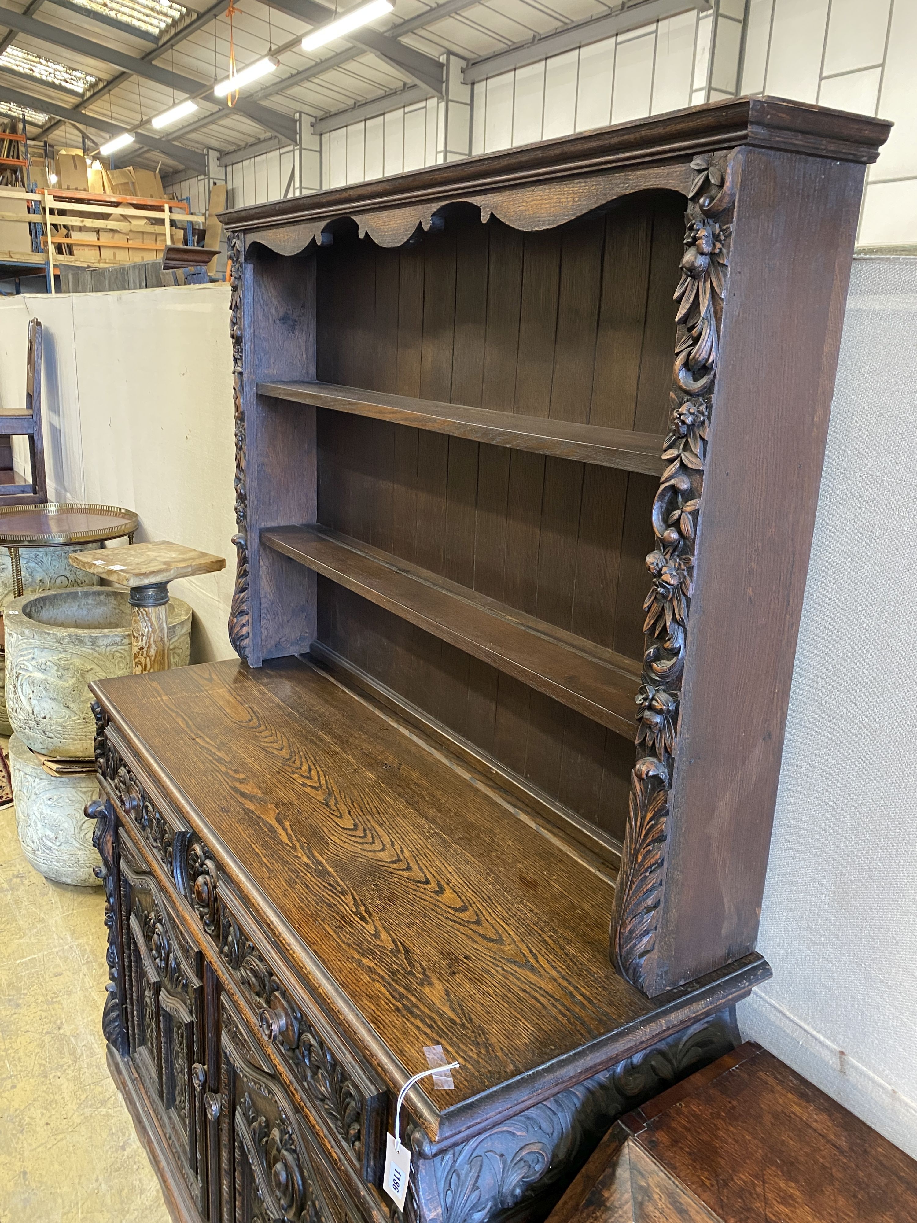 A late 19th century Flemish carved oak dresser, length 135cm, depth 50cm, height 192cm - Image 3 of 3