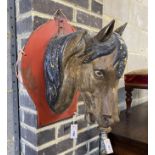 A vintage painted zinc horse head wall applique, height 43cm