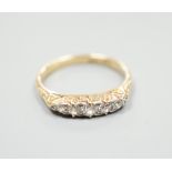 An 18ct and graduated five stone diamond set half hoop ring, size O, gross weight 3 grams.