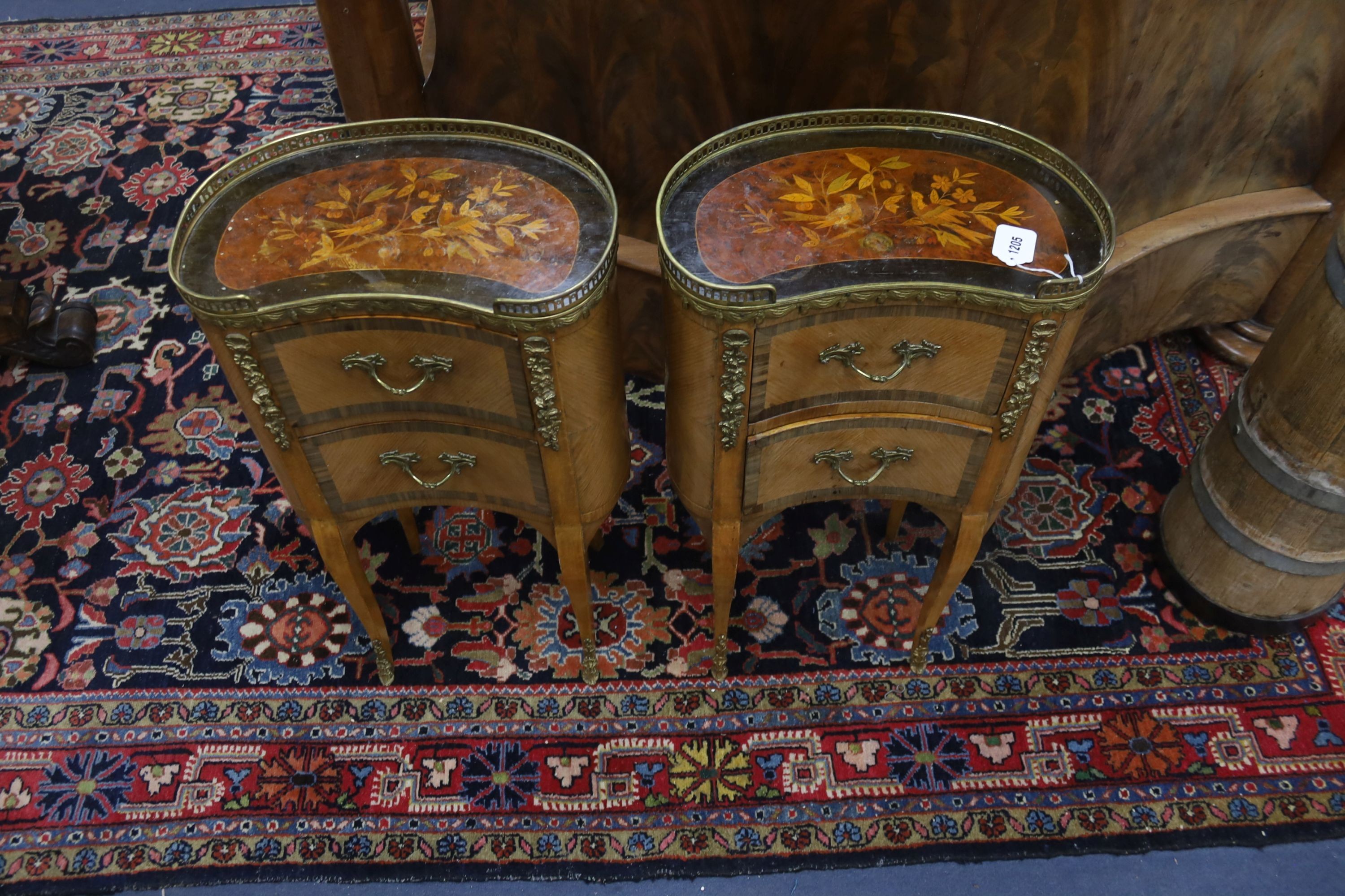 A pair of French marquetry inlaid gilt metal mounted kidney shaped two drawer bedside cabinets, - Image 2 of 2