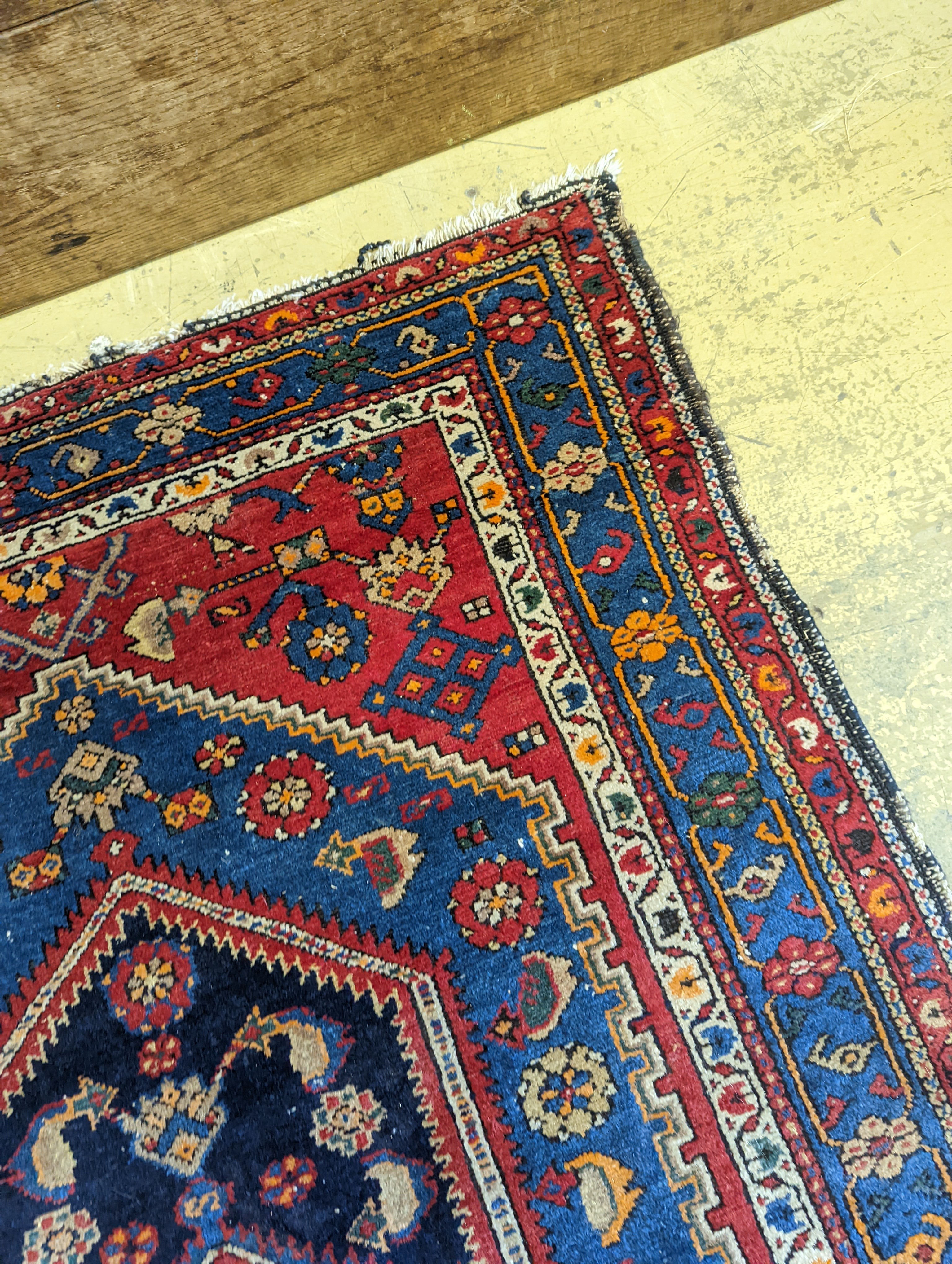 A Caucasian brick red ground rug, 194 x 130cm - Image 6 of 13