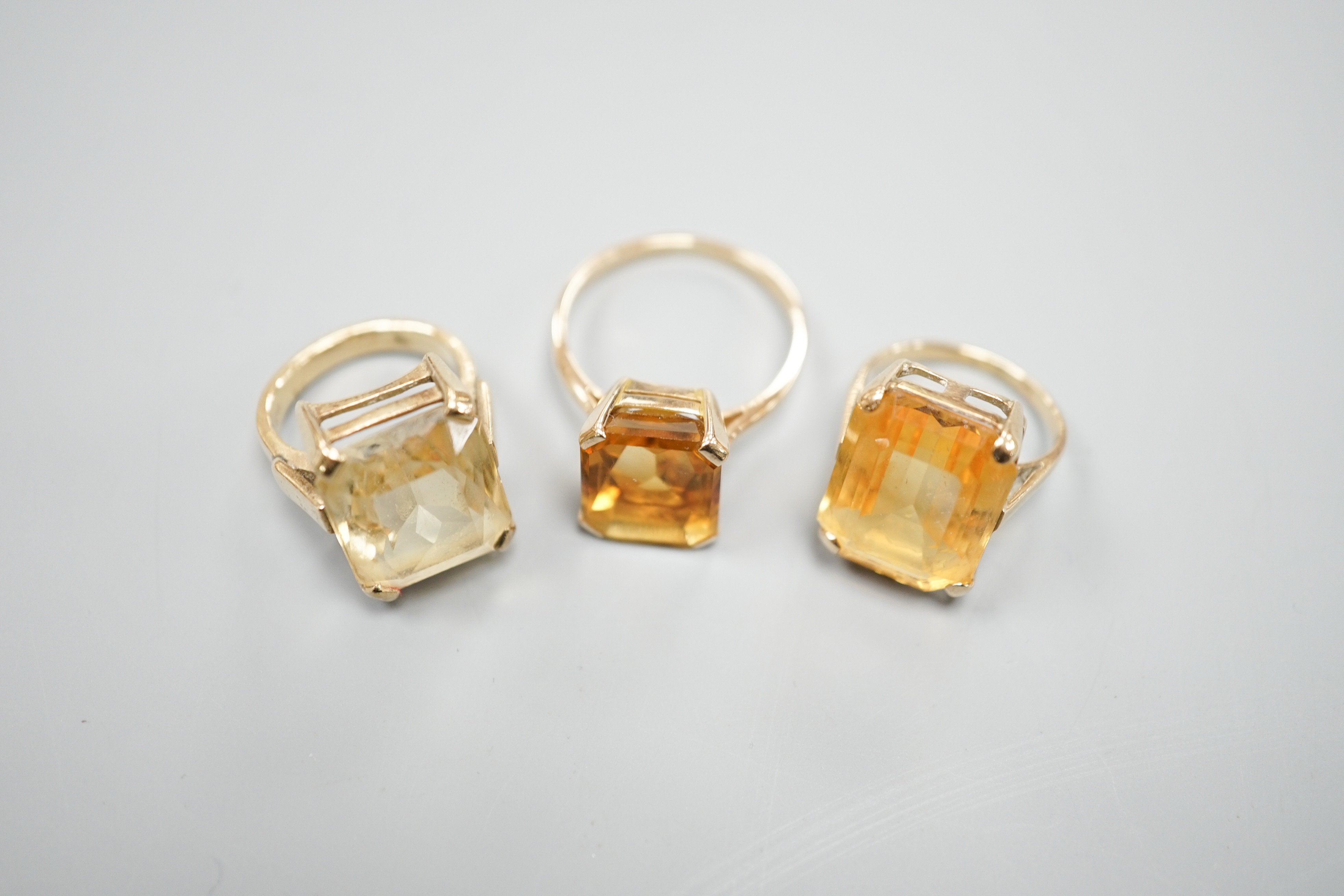 Three yellow metal and citrine set dress rings, one stamped 9ct, gross weight 11.9 grams. - Image 2 of 5