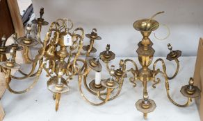 A brass two tier twelve branch electrolier and an associated six branch electrolier, 12 branch 46