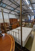 A Victorian style brass four poster double bed frame, with an Odd Mattress Company Hampton 150cm