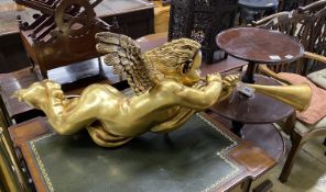 A gilt composition hanging herald angel, length 130cm