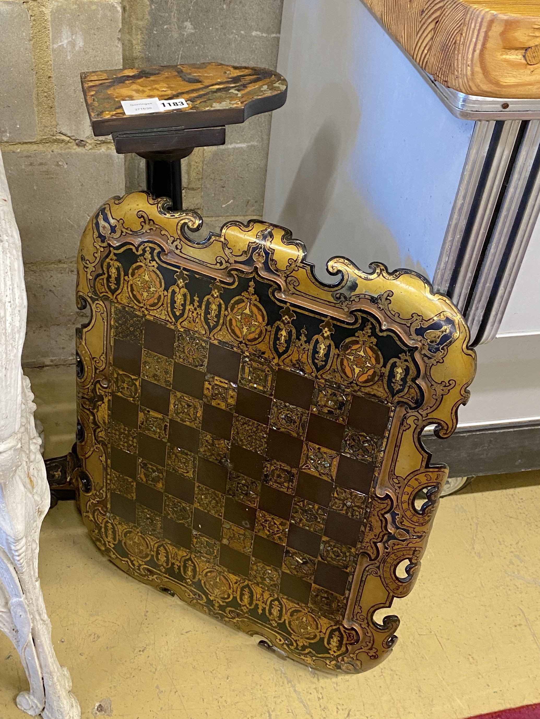 A Victorian Jennens and Bettridge papier mache tilt top games table, width 63cm, depth 50cm,