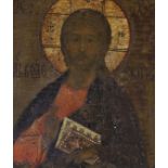 An 18th century Russian School icon of a bishop Saint, 30.5 x 23.5cm