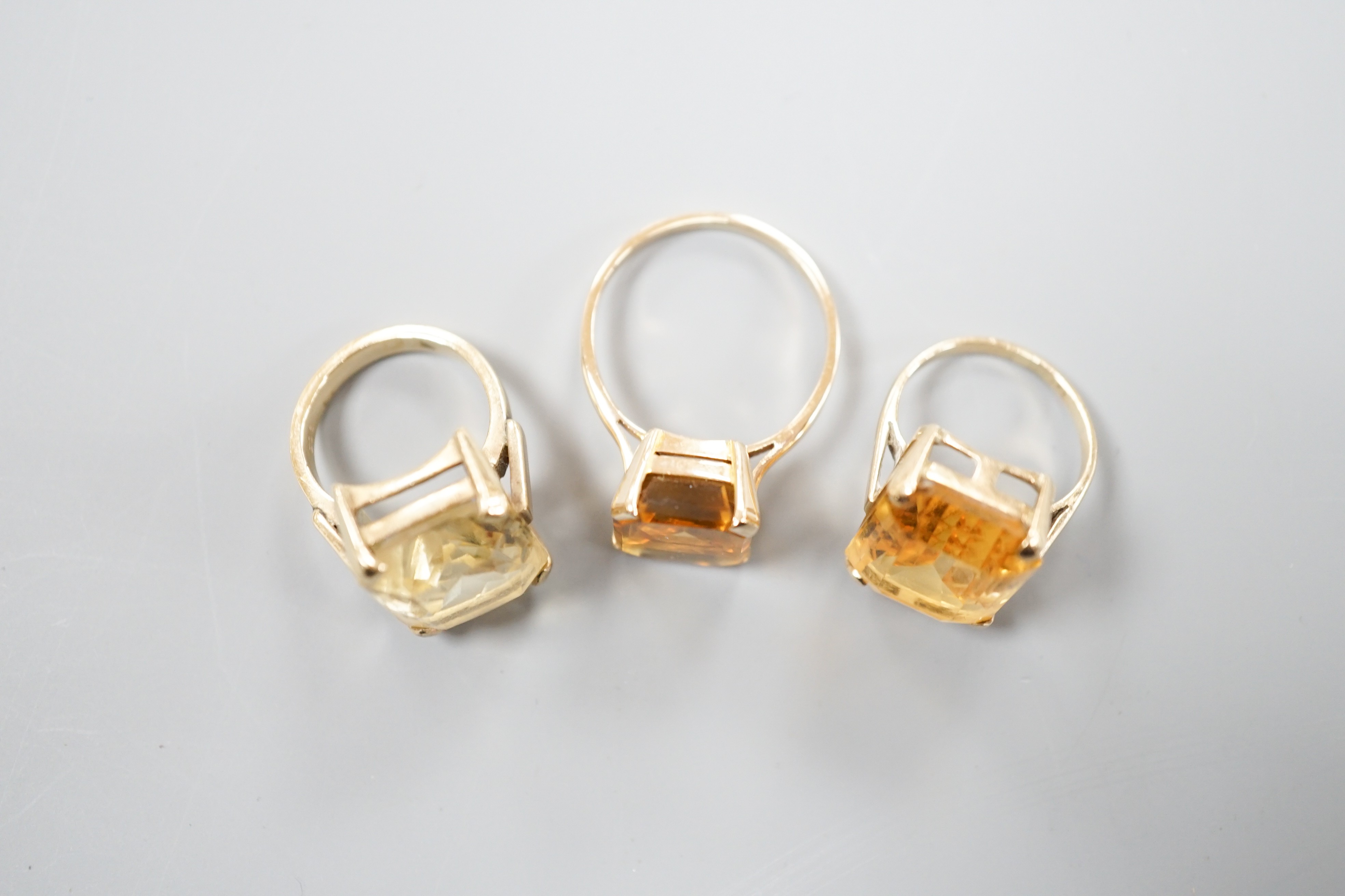 Three yellow metal and citrine set dress rings, one stamped 9ct, gross weight 11.9 grams. - Image 3 of 5