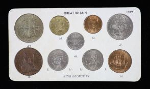 George VI nine coin specimen set for 1949, second issue, including the rare 1949 brass threepence (