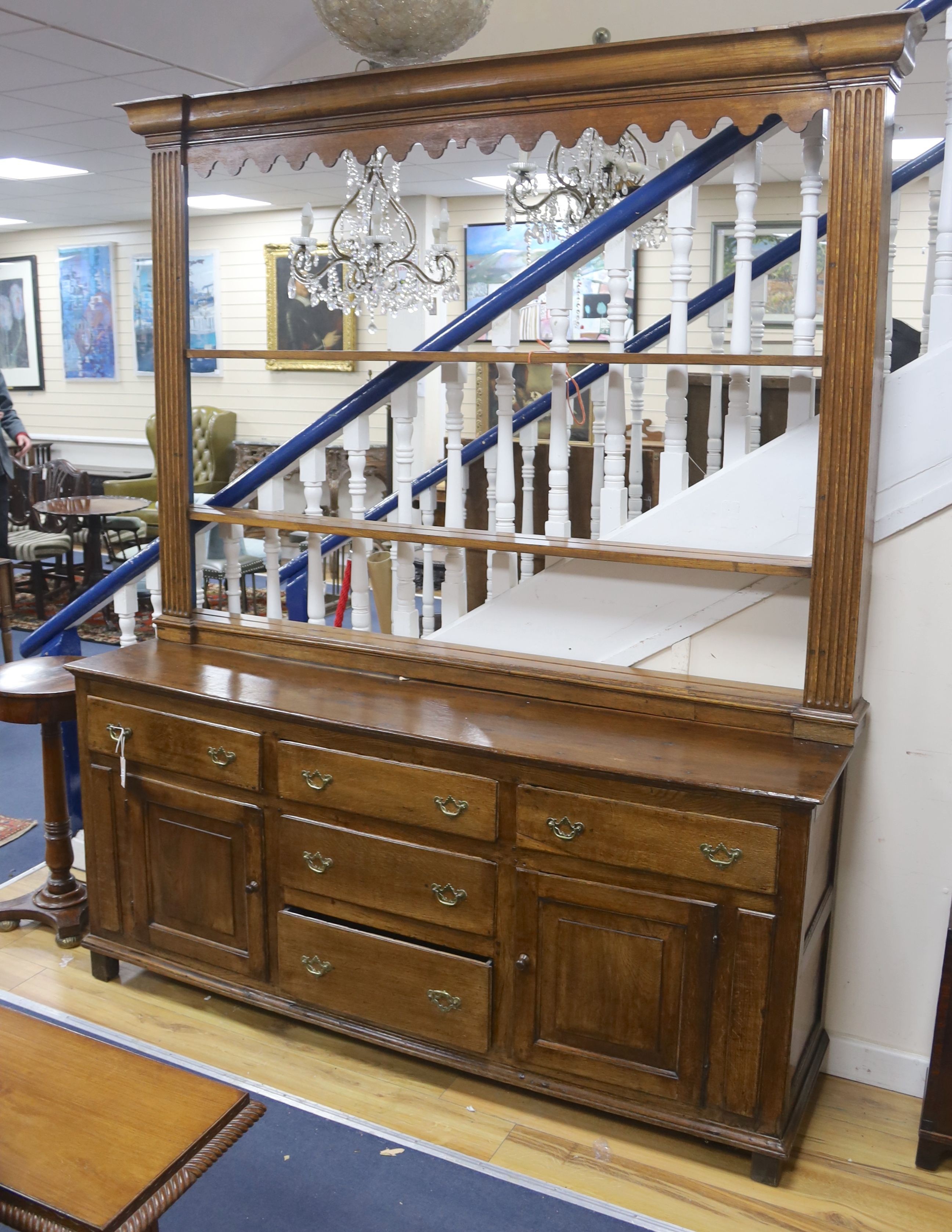 A George III Welsh oak dresser, length 183cm, depth 43cm, height 223cm