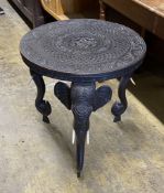 An Indian circular carved hardwood occasional table, diameter 60cm, height 63cm