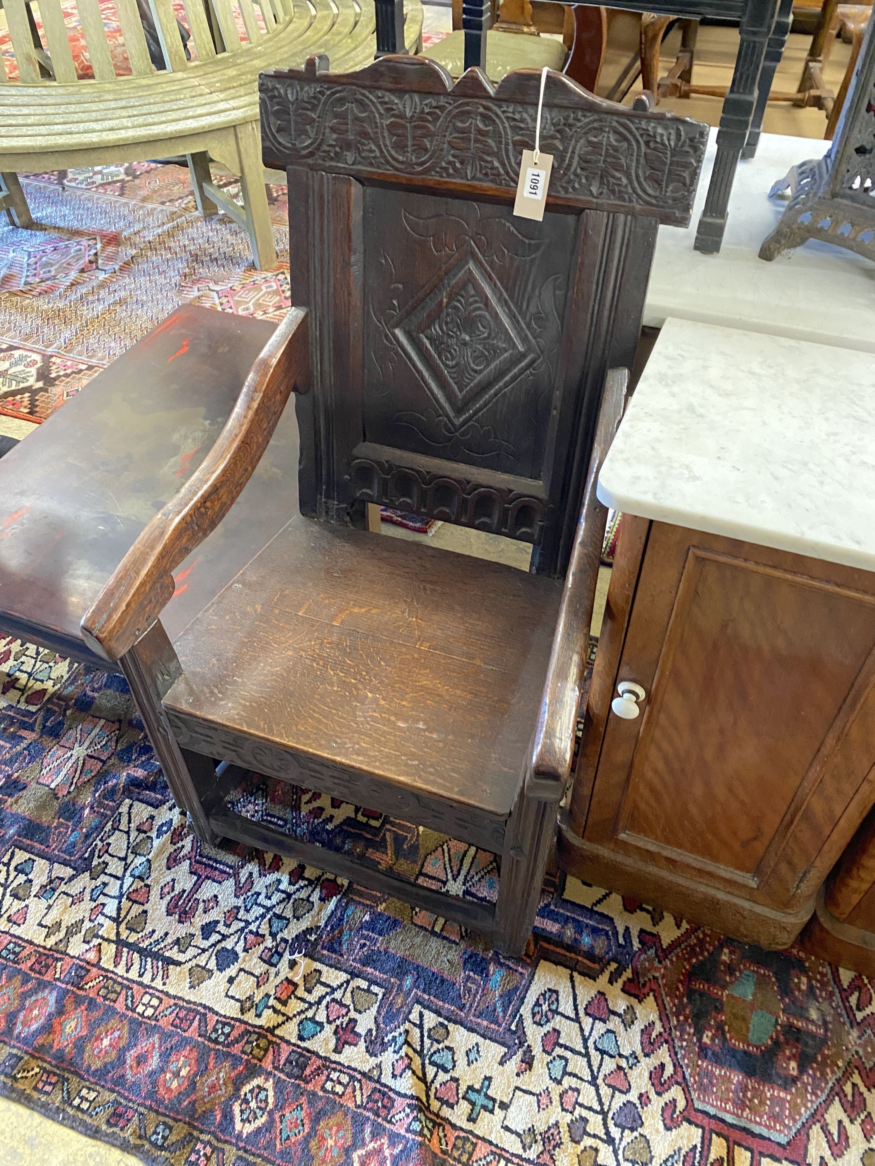 A 17th century and later oak wainscot chair, width 56cm, depth 54cm, height 100cm