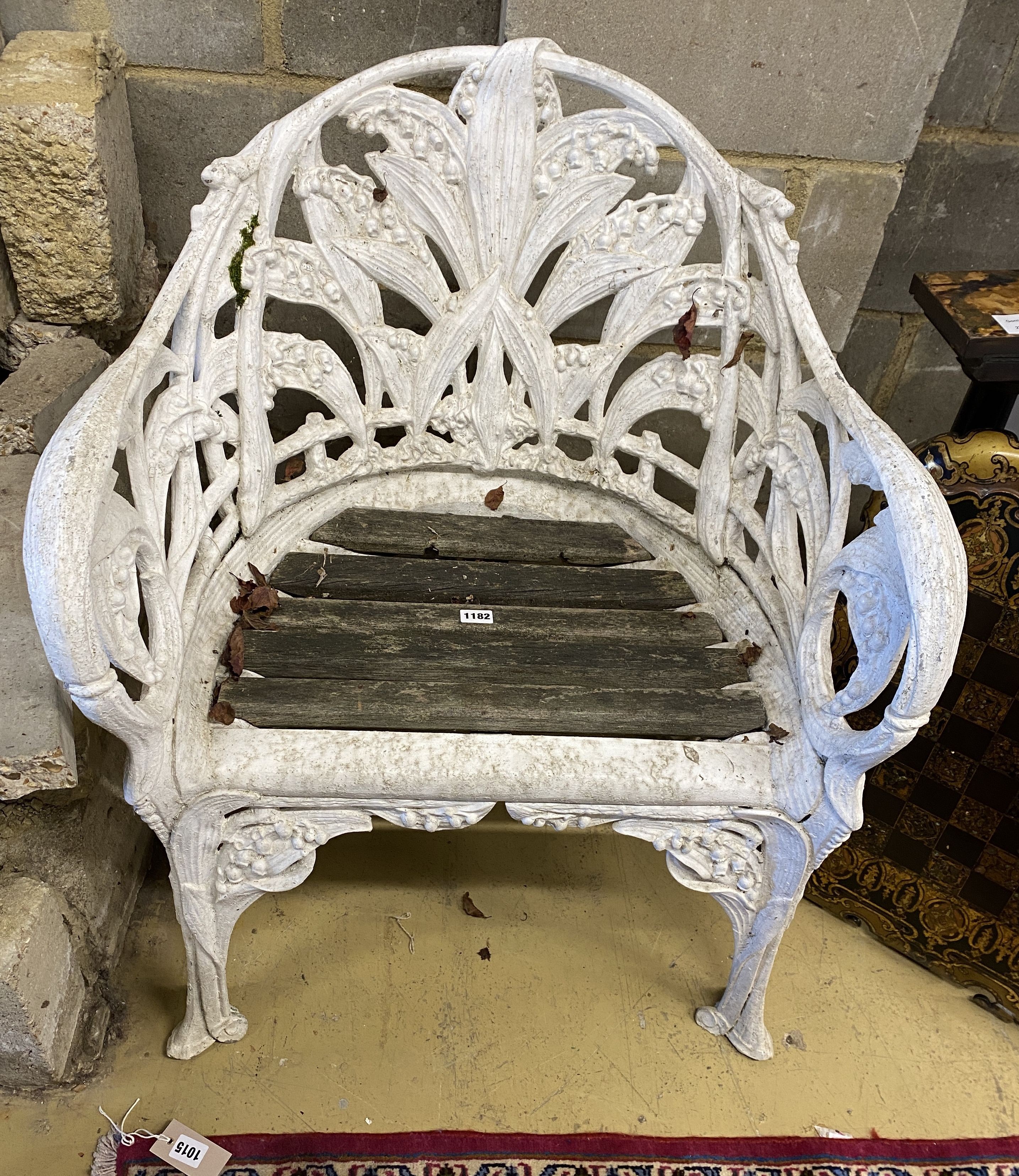 A Coalbrookdale style cast aluminium garden chair with slatted wood seat, width 65cm, depth 52cm,