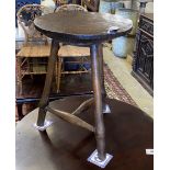 A late 18th / early 19th century circular burr elm and ash cricket table, diameter 60cm, height