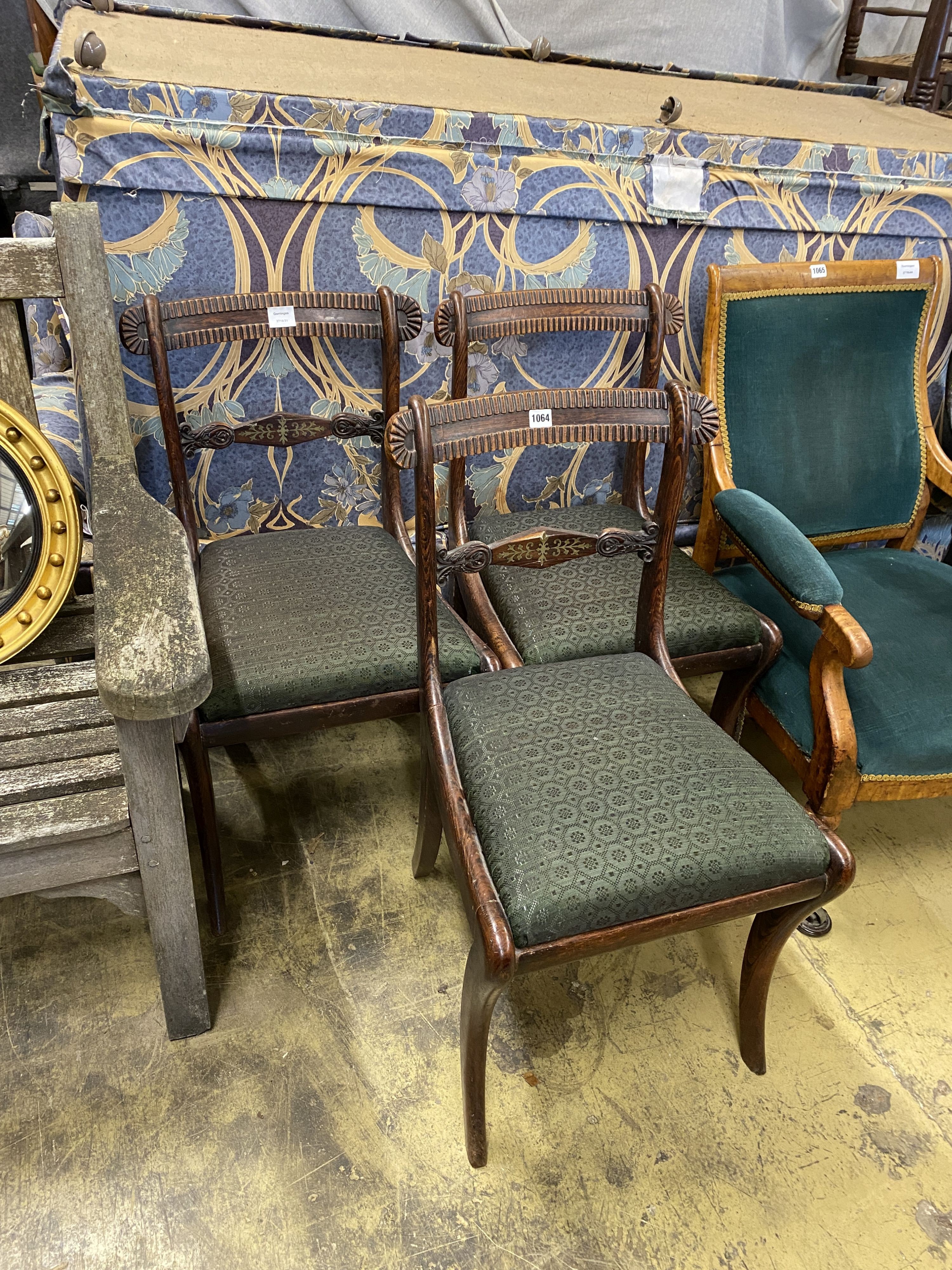 A set of three Regency simulated rosewood dining chairs, with brass-inlaid rails and sabre legs - Image 2 of 2