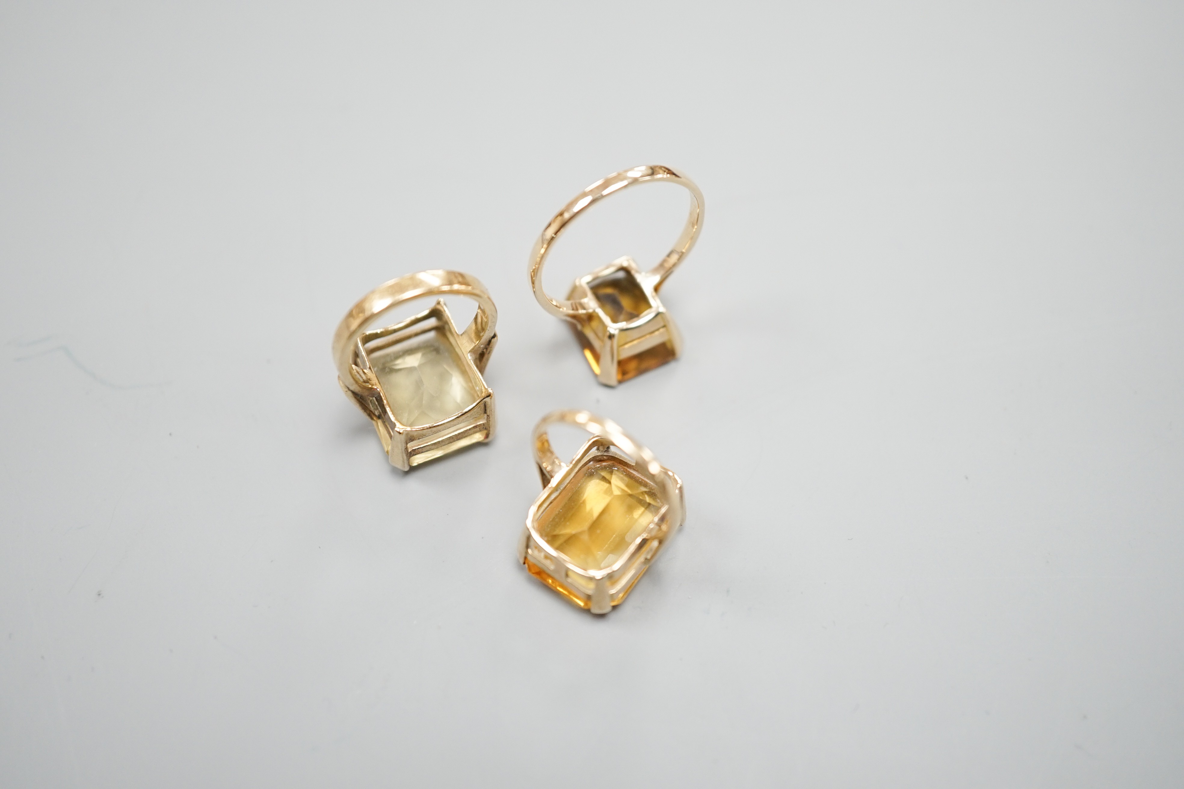 Three yellow metal and citrine set dress rings, one stamped 9ct, gross weight 11.9 grams. - Image 5 of 5