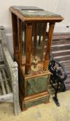 A near pair of Empire style gilt metal mounted walnut mirrored pier tables, (lacks one finial) width