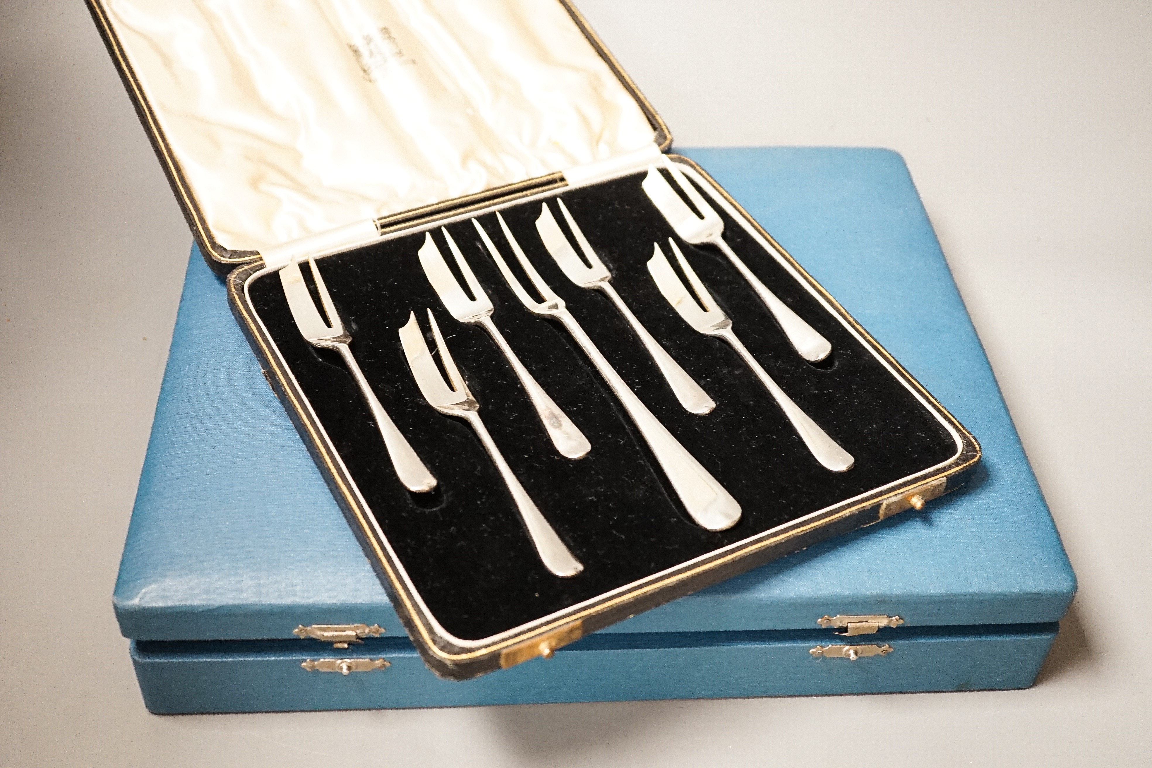 A quantity of cased silver plated cutlery sets