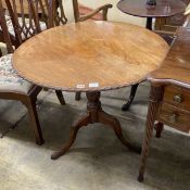 A George III carved circular mahogany tilt top tea table, diameter 88cm, height 71cm