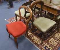 A set of six Victorian style mahogany balloon back dining chairs together with a Victorian dining