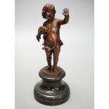 Franz Iffland (German, 1862-1935), bronze of a child holding a Punch puppet, dated 1886 20cm