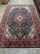 A Tabriz blue ground carpet, 290 x 200cm