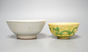 A Chinese Teksing cargo bowl c1820 and a yellow ground 'dragon' bowl. Largest 16cm diameter.