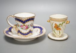 A late 19th century Royal Worcester cup and a Sevres style cup and saucer, diameter 16cm