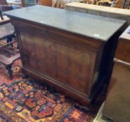 A 19th century continental flamed mahogany commode with black polished marble top, width 126cm,