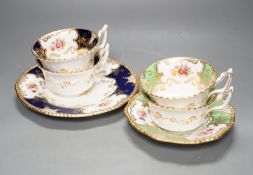 A large set of Coalport blue ground tea and coffee service and similar green ground tea wares