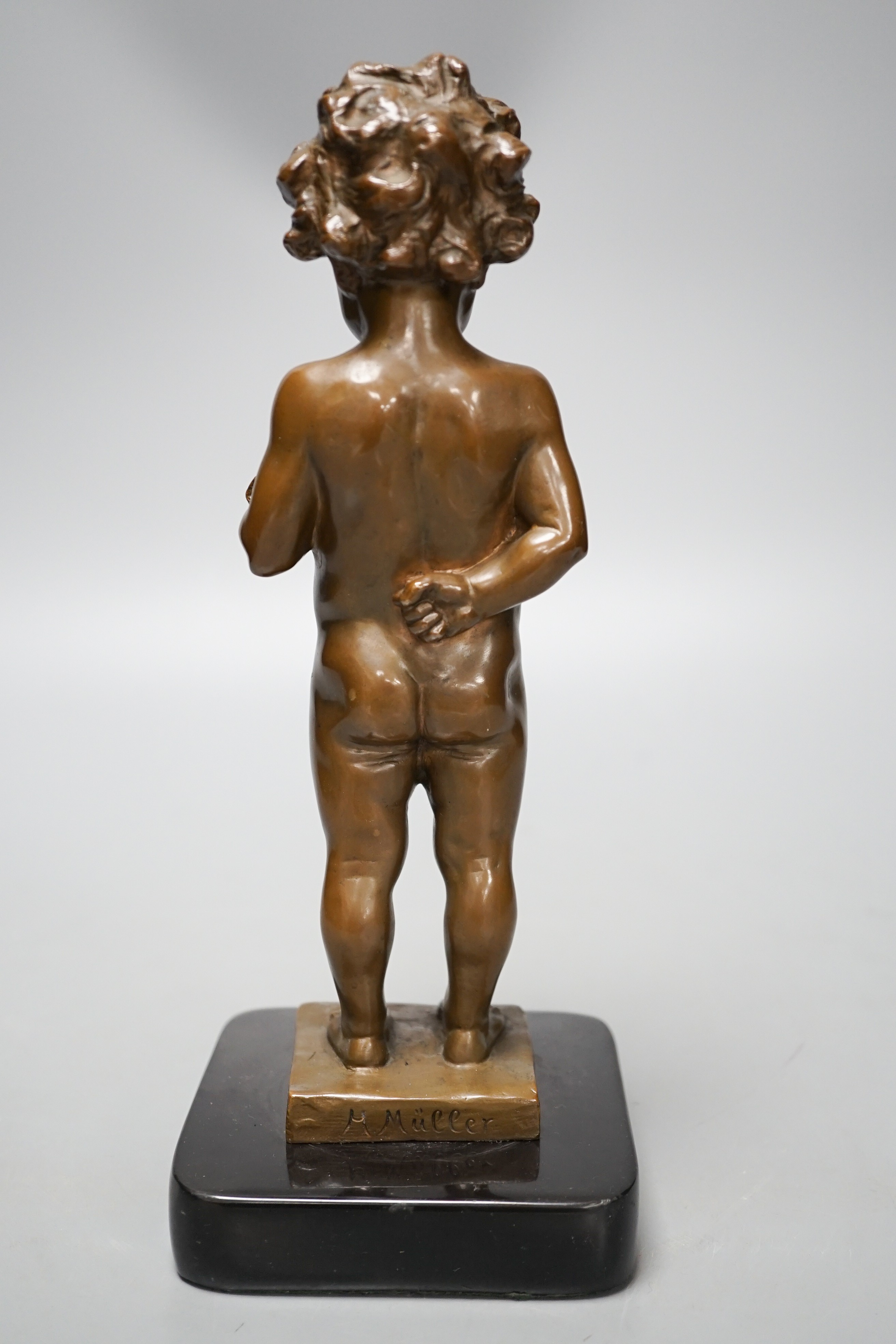 A bronze of a putto holding flowers, signed ‘M.Müller’ 25cm - Image 3 of 5