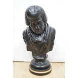 A black painted plaster bust of a judge, inscribed 1826, 49cms high.