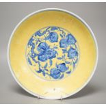 A Chinese yellow ground dish a/f. 28cm