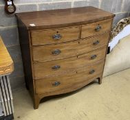 A Regency bow fronted mahogany chest of two short and three long drawers, width 104cm, depth 51cm,