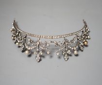 An Edwardian white metal and paste set tiara, 13cm.