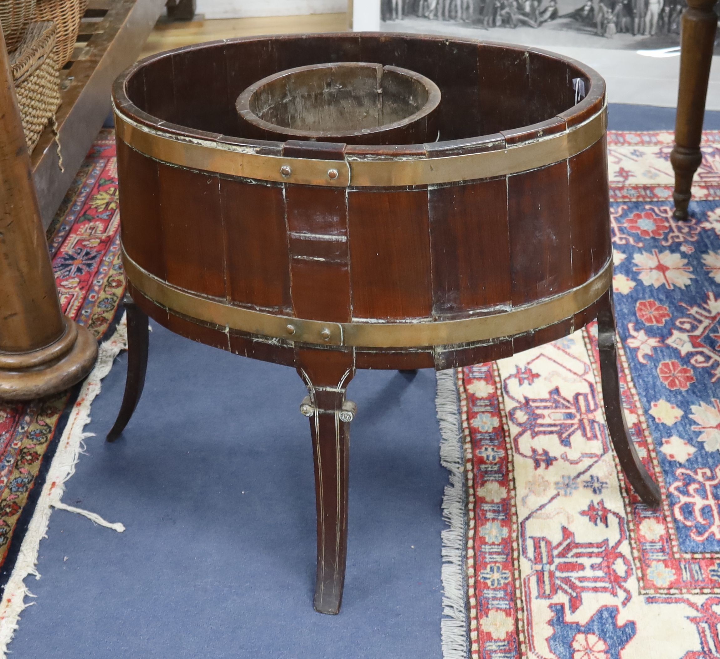 A George III provinical brass bound mahogany planter, width 62cm, depth 42cm, height 60cm,