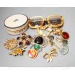 A mixed lot of costume jewellery including Christian Lacroix, scarab brooch stamped Valentino,