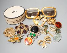 A mixed lot of costume jewellery including Christian Lacroix, scarab brooch stamped Valentino,