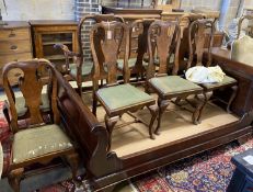 A set of eight George I walnut dining chairs, two with arms