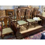 A set of eight George I walnut dining chairs, two with arms