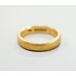 A 22ct gold wedding band, size O, 8.4 grams.